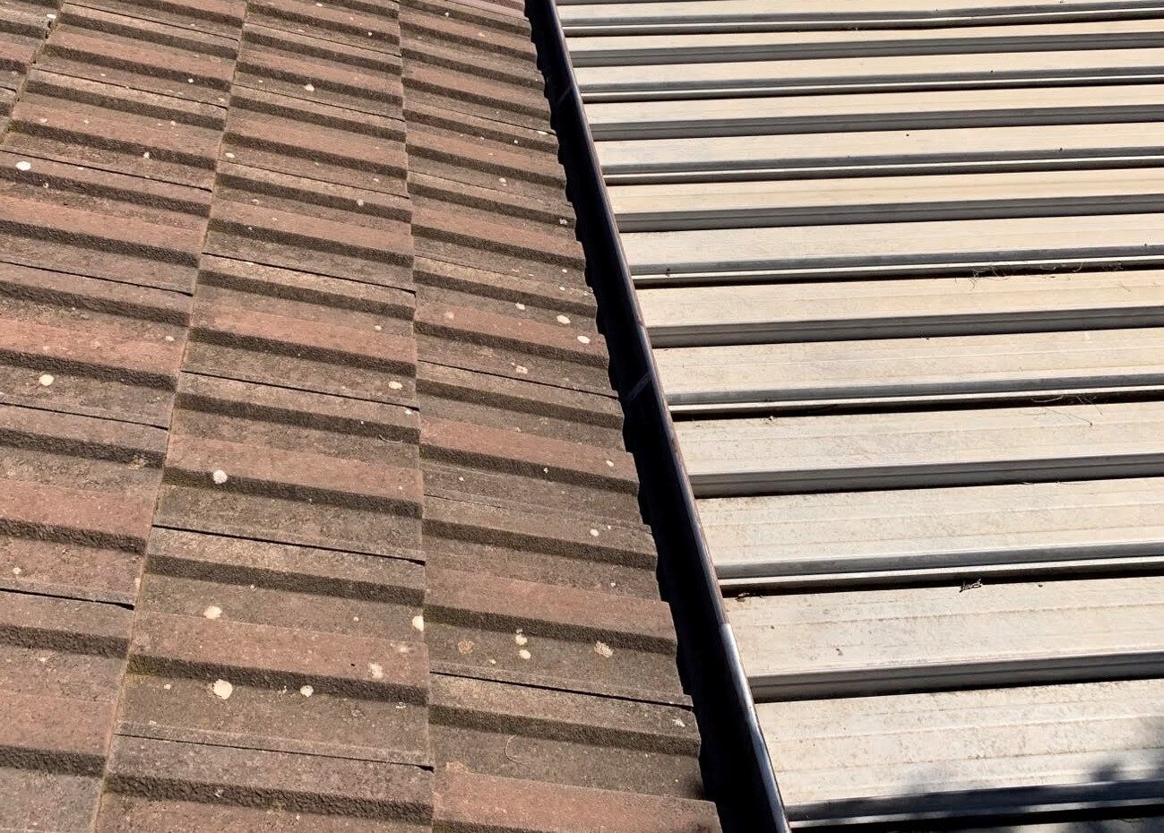 Photo of roof with no gutter guard installed